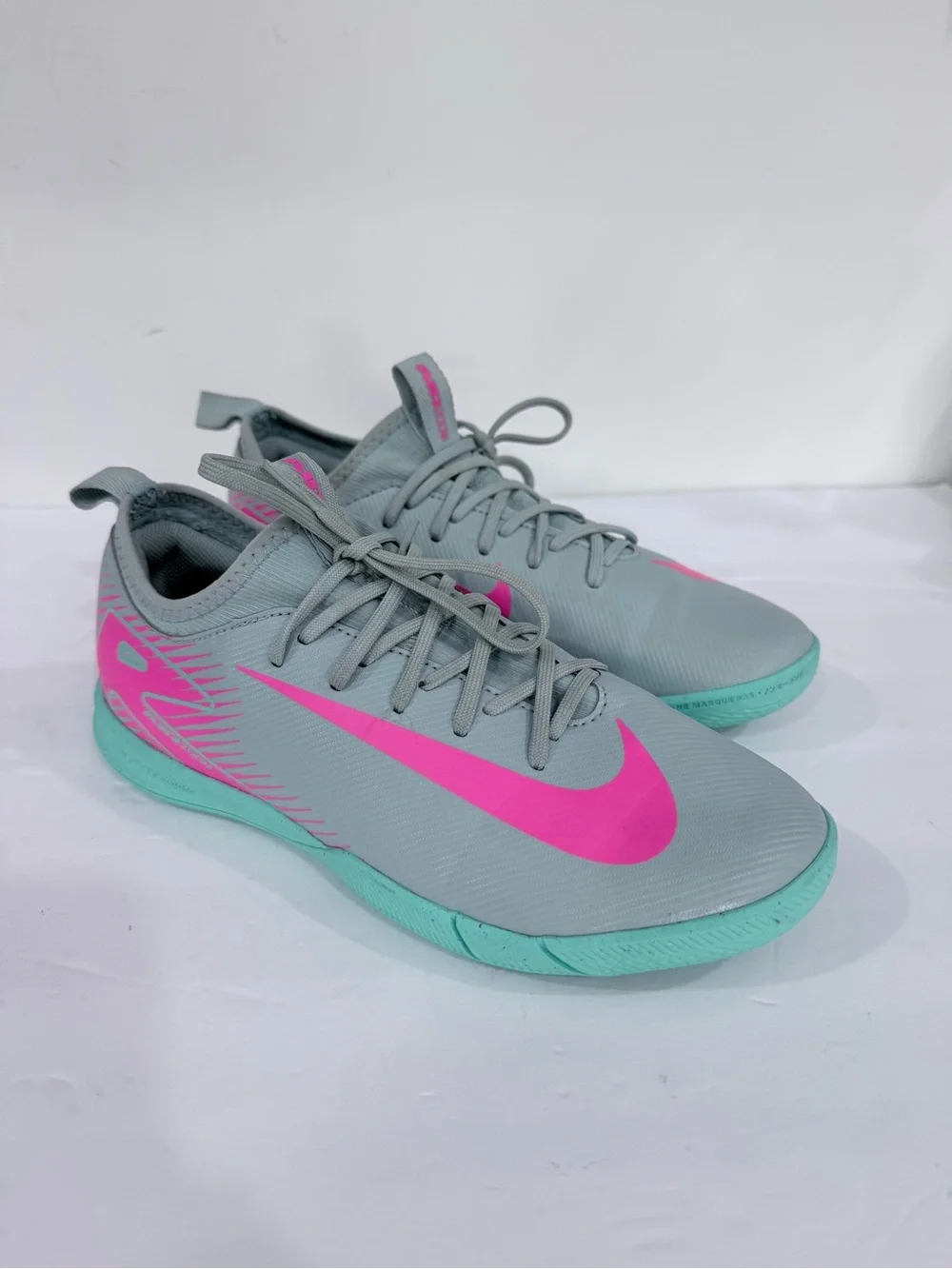 Kids Grey Athletic Shoes with Pink Swoosh and Teal Sole